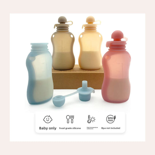 Set of colorful silicone baby bottles with accessories on a white background