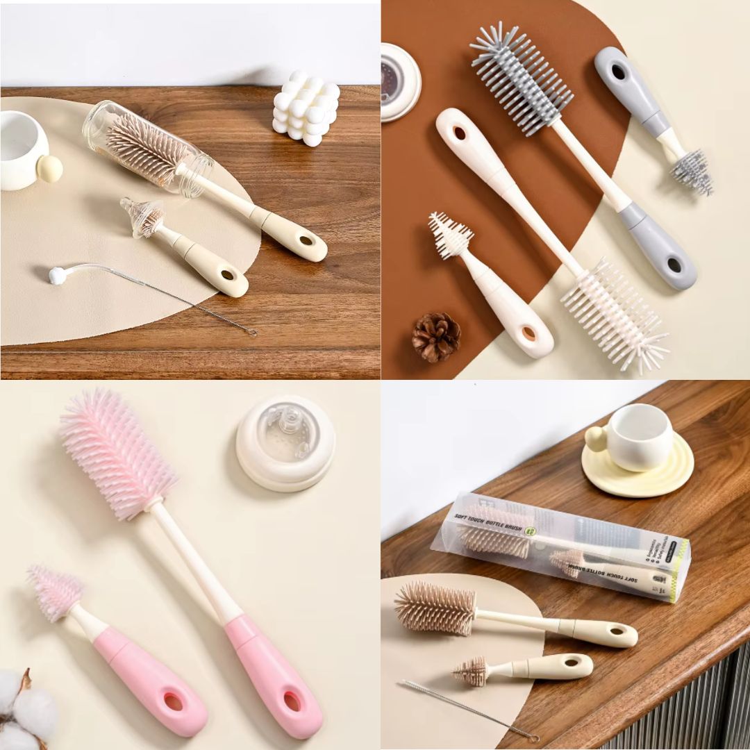 Set of cleaning brushes with different handles and bristle designs on a wooden surface.