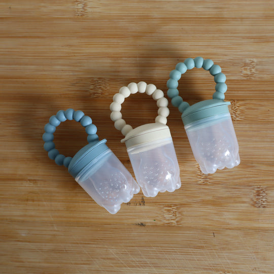 Baby Fruit Feeder  and Tray - Safe Self-Feeding & Teething Relief.