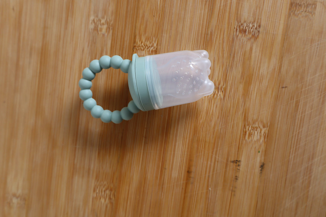 Baby Fruit Feeder  and Tray - Safe Self-Feeding & Teething Relief.